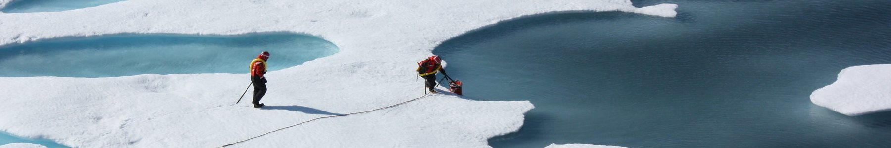 Two men on an ice covered water